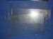 Model T Replacement rear window glass pieces with frames for open cars only. The original plastic in the open car rear windows was damaged easily. These were glass replacements available to fix the rear windows. Original glass, frames and hardware in original box. We have a limited quantity of these. This is a Used Parts Special. - ZZZ_0014