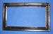 Model T Replacement rear window glass pieces with frames for open cars only. The original plastic in the open car rear windows was damaged easily. These were glass replacements available to fix the rear windows. Original glass, frames and hardware in original box. We have a limited quantity of these. This is a Used Parts Special. - ZZZ_0014